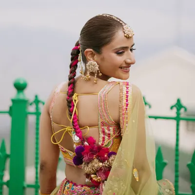 My bride Vasav was a dream for her Haldi. We created a soft, minimal makeup look but added a playful purple winged liner for a pop of fun. The real showstopper was her beautifully pleated parandi choti, adding the perfect traditional charm.