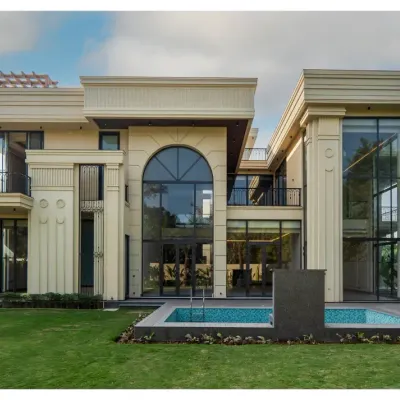 This masterpiece in Sultanpur, New Delhi, is a perfect blend of classical charm and modern sophistication. The facade features grand arches, decorative columns, and impressive double-height glass, creating a majestic and timeless appeal.