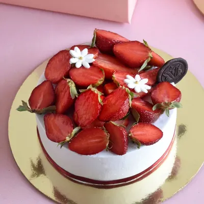 Our simple and elegant Strawberry Shortcake. It features layers of light vanilla sponge, fresh whipped cream, and lots of juicy strawberries. A seasonal hit for years.