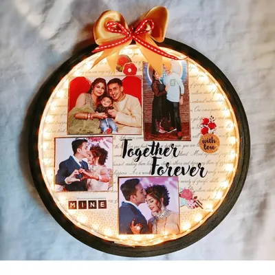 My Light Photo Hoop all lit up! It's a 9-inch hoop decorated with your photos and a 'Together Forever' message, perfect for an anniversary gift.