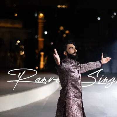 A signature shot of Ranveer Singh from the 'Dharohar Kashi Ki' fashion show. The text overlay makes it a perfect piece for promotional content, highlighting the star of the evening.