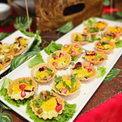 Enjoy the authentic taste of chaat with my beautifully arranged chaat bites. This setup for a brand launch features papdi chaat and other tangy treats, complete with all the chutneys and toppings.