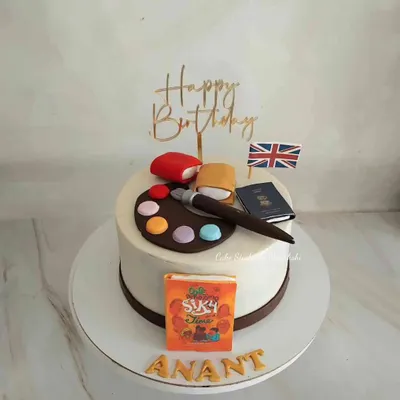 For Anant, who designs book covers, paints, and loves to travel. I brought his story to life on this cake, featuring his passions for art and adventure.