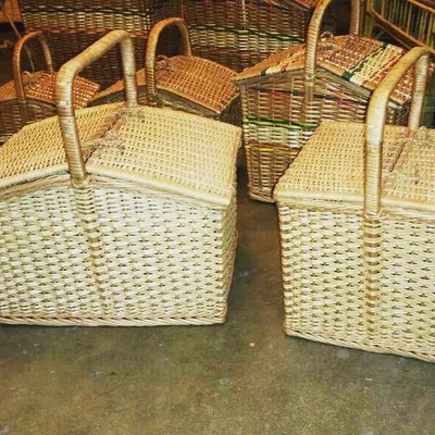 Here are two of my traditional square picnic baskets. They feature a strong weave, a sturdy handle, and a fitted lid to keep contents secure, making them ideal for outdoor trips.