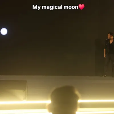 A magical moment on stage. The simple, dramatic lighting here highlights the mystery and focus of my performance.