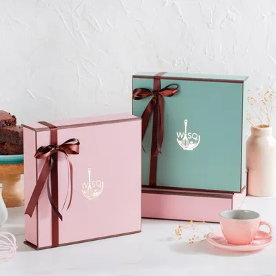 Our signature gift boxes are available in a variety of colours, including this lovely pink and Tiffany blue. They are sturdy, elegant, and designed to make your gift feel extra special.