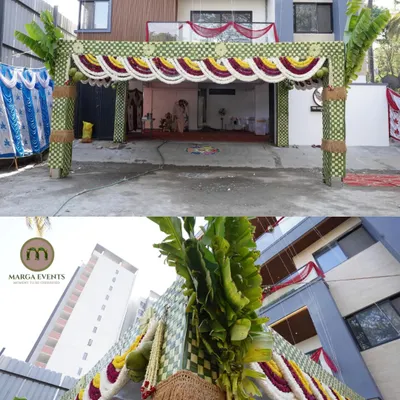 A new home deserves a grand welcome. I constructed this large, traditional entrance arch for a housewarming using authentic materials like woven coconut leaves, fresh banana leaves, and garlands of marigold and jasmine for an auspicious beginning.