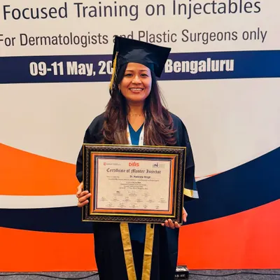 I believe continuous learning is essential to providing the best care. Here I am receiving a certificate for completing a customized cadaveric course on injectables, ensuring my techniques are precise and safe.
