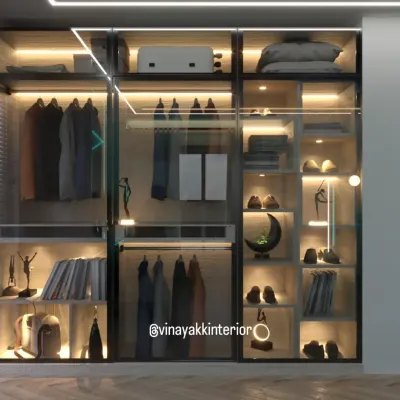 This is organization elevated to an art form. A walk-in wardrobe with transparent glass shutters and integrated LED lighting turns your collection of clothes, shoes, and accessories into a stunning display. It's not just storage; it's a personal boutique.