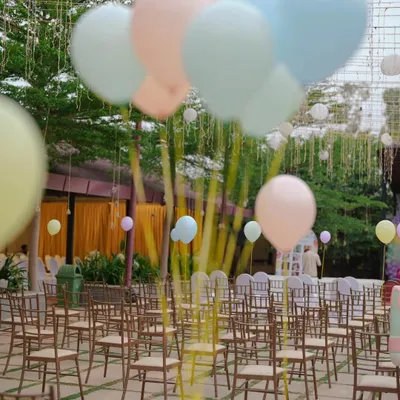We were so happy to bring this pastel carnival theme to life for Vihaan's birthday. The outdoor space was filled with chairs for guests and decorated with large, soft-colored balloons in pastel pink, blue, and yellow, creating a sweet and playful atmosphere for the little one's big day. It's a joy to create these memories for families.