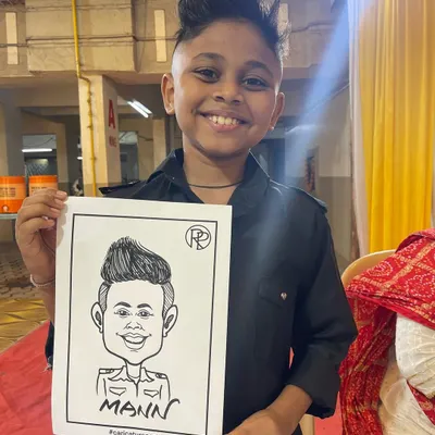 It's always a blast drawing for kids. I loved capturing this young man's cool style at a Haldi event in Panvel. Caricatures are a fantastic and fun activity for children's parties.