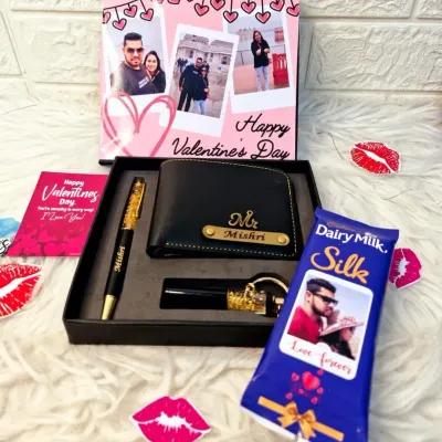 A perfect Valentine's Day surprise. This hamper features a personalized wallet, pen, and keychain, along with a custom photo chocolate bar and a Valentine's themed gift box.