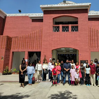 Our students and instructors pose for a group photo outside the College of Art, Delhi, after an inspiring visit to the annual art exhibition.