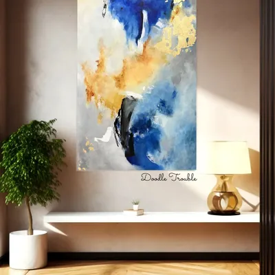 This large blue and gold abstract painting is shown in a different lighting and setting, demonstrating its versatility. It can anchor a room and complement various decor styles, from modern to transitional.
