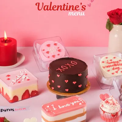 Our Valentine's menu is here to make your sweet gestures extra special. This spread includes our "XOXO" chocolate cake, "I love you" pastry, and heart-themed bento cakes.