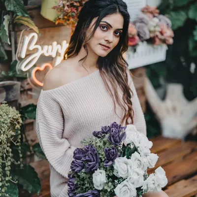 While I design the world your event lives in, my ultimate goal is to capture you in it. This is an example of my portrait photography, focusing on capturing natural expressions and candid moments against the beautiful backdrops we create together.