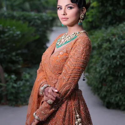 A professional shot of a model adorned with my party henna. This elegant and minimal design is perfect for guests who want to look festive and chic.