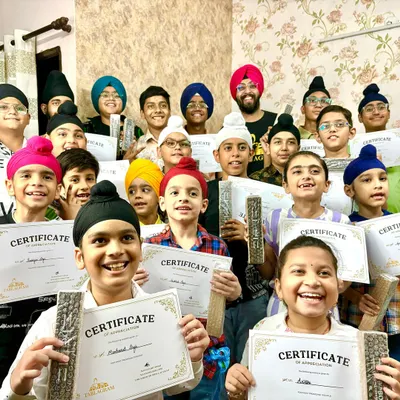 The smiles of achievement! Here are my students proudly holding their certificates after a summer camp session. I believe in recognizing hard work and progress at every step of their musical journey.