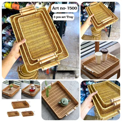 This set of three handwoven serving trays with wooden handles is a must-have for any host. They are perfect for serving drinks, snacks, or as a decorative base for your centerpieces.