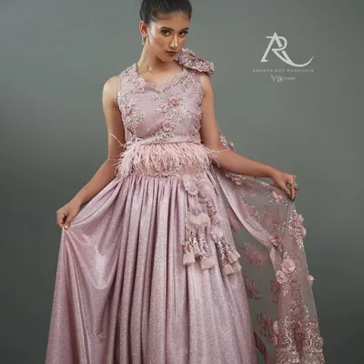 This full-length shot is essential for any lookbook, clearly presenting the entire silhouette of the designer gown. I used balanced studio lighting to ensure the color is accurate and every detail, from the feathered waist to the embroidered dupatta, is visible.
