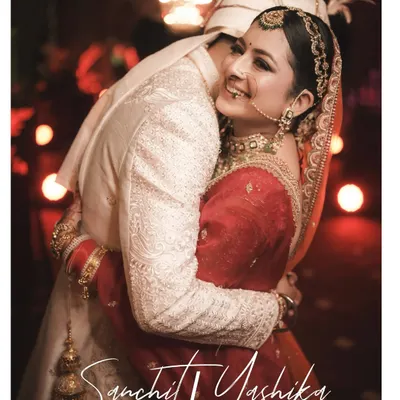 The purest moments are often the most candid. A heartfelt hug between the bride and groom, full of smiles and genuine emotion, right after the ceremony.