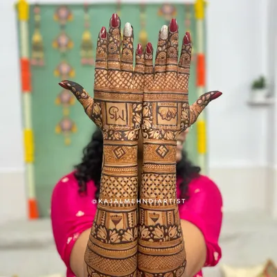 A stunning full-backhand bridal design. The intricate geometric patterns, floral bands, and auspicious symbols create a dense and beautiful look.