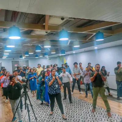 Employees at Lenovo participating in a group drill, learning the basic fighting stance. Our corporate workshops are interactive and get everyone involved.