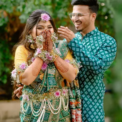 A candid, joyous moment from a traditional baby shower. Capturing genuine laughter and interactions like this is what makes event photography so special.