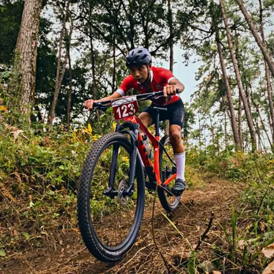 Full focus during the cross-country (XC) race at the Northeast Olympic Games 2022. Our team members regularly compete in national events, which gives us the insight to organize professional and exciting races for the community.