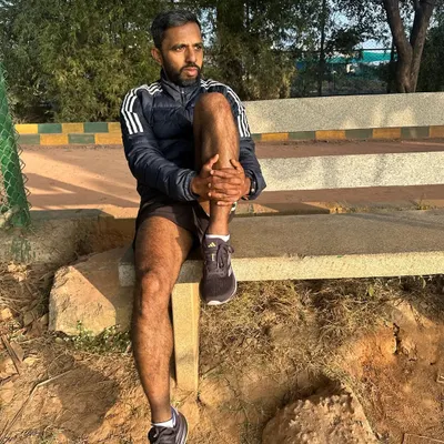 Taking a moment to stretch after a run. Proper gear is important, and having comfortable, well cushioned shoes like these Adidas Supernova Rise makes a huge difference in daily training and recovery.