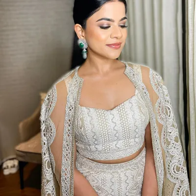 The epitome of soft glam. I created a gentle smokey eye with a hint of shimmer, paired with glossy lips and a sleek hairstyle for a look that is pure elegance.