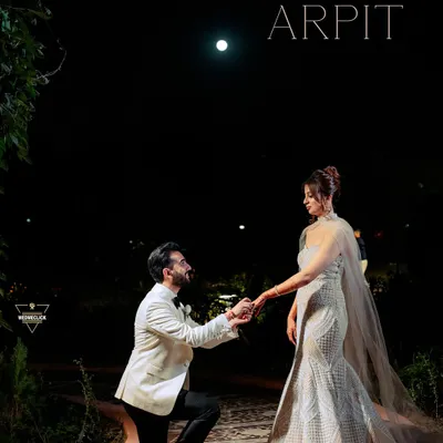 A proposal under the moonlight. For this shot, we created a truly cinematic and romantic scene. The dramatic lighting and elegant attire come together to create a powerful, emotional portrait that feels like a still from a classic film.