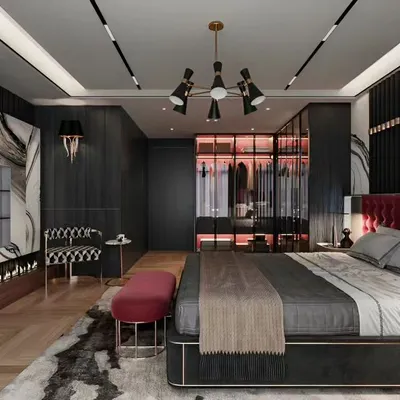 We designed this master bedroom with a dark, luxurious theme. It features a floor-to-ceiling wardrobe with integrated pink backlighting, a statement chandelier, and a sleek, modern bed, creating a bold and sophisticated retreat.