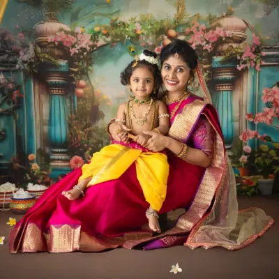 A complete setup for a magical Yashoda Krishna photoshoot. I style the entire scene with rich fabrics, traditional props, and a divine backdrop to create an unforgettable portrait of you and your child.