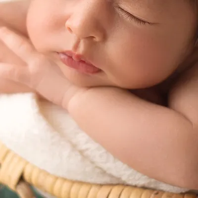 A macro shot of this baby's perfect lips and nose. These are the tiny features that will change so quickly, and I love preserving them for you.