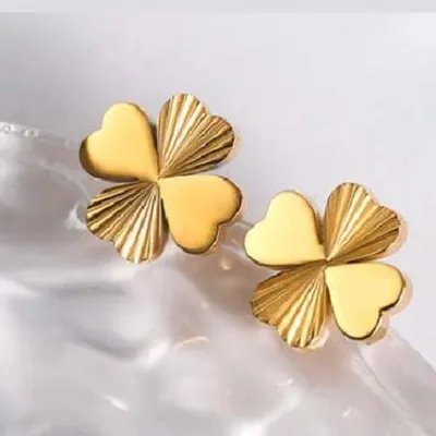 A beautiful pair of four-leaf clover stud earrings with a textured, pleated finish. These gold-toned earrings are a unique and stylish way to wear a classic symbol of luck.