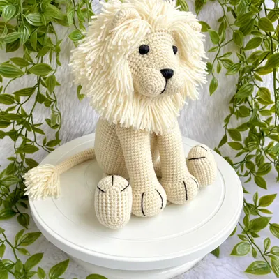This majestic white lion has such a beautiful, full mane. I designed him in a sitting position, making him a wonderful and regal-looking plushie for a shelf or bed.