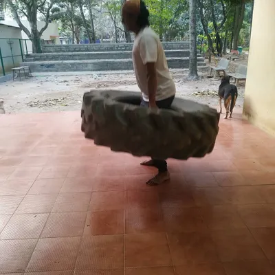 The tire carry is a test of total body strength and endurance. This exercise builds the powerful core and legs needed for Kyokushin stances and kicks.