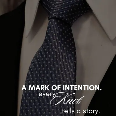 A mark of intention, every knot tells a story. This close-up of a perfectly knotted tie highlights our belief that sophistication is stitched into the smallest details of an ensemble.