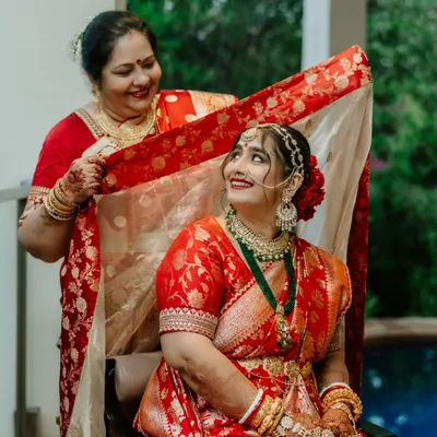 A heartwarming moment between a bride and her mother, for whom I had the pleasure of doing hair and makeup. Her look was classic and elegant for this traditional Bengali wedding.