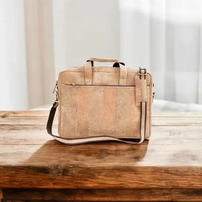 This stylish and professional laptop bag is crafted from sustainable cork material, offering an eco-friendly and sophisticated gift for employees or clients.