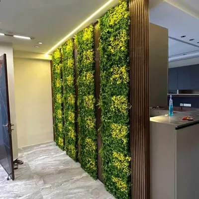 Transform your balcony or wall into a green oasis with our artificial vertical gardens. Paired with WPC panels, this installation brings life and nature to an indoor space with zero maintenance required.