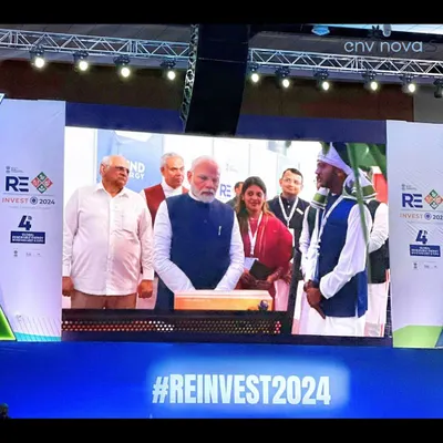A powerful image from Re-Invest 2024, where our interaction with Honorable Prime Minister Shri Narendra Modi was featured on the main event screen. This highlights the national significance of our work in Ayodhya and the renewable energy sector.