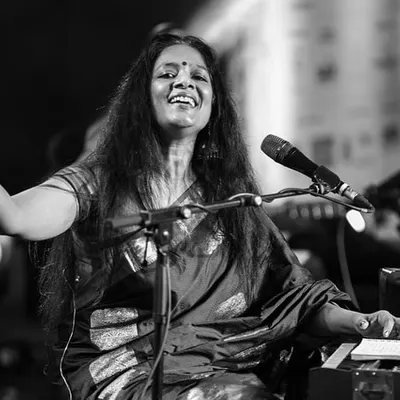 A magical night performing at the Bengaluru Ganesh Utsava. This black and white photo captures the emotion of being lost in song, even on a large stage.