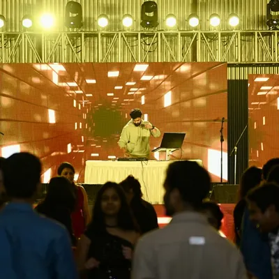 On the decks at a large private event. With professional lighting and a massive LED screen, I can transform any venue into a high end concert experience for your guests.