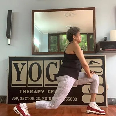 The runner's lunge, or Ashwa Sanchalan, is a deep stretch for the hips and thighs. We modify this pose to be gentle and supportive, helping to release tension held in the lower body.