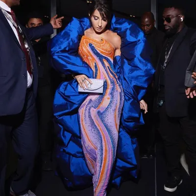 For Nora Fatehi's main IIFA 2023 appearance, we went for high drama with this structural Jean-Pierre Khoury gown. The voluminous royal blue wrap over a psychedelic-print catsuit was a bold fashion choice that truly owned the carpet.