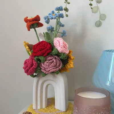 I love receiving aesthetic pictures from my clients! This beautiful shot features one of my custom bouquets in a lovely rainbow-shaped vase, styled perfectly on a nightstand.