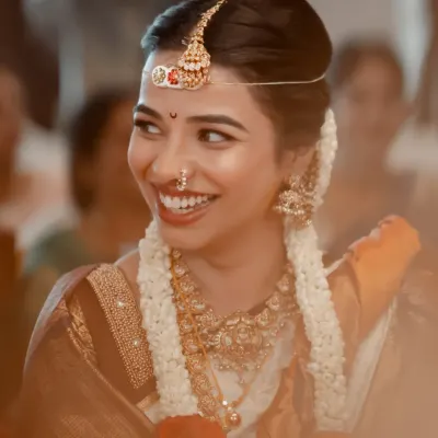 A smile that lights up the room. We capture the pure, unfiltered joy of a bride on her wedding day.
