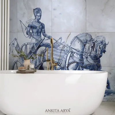 This bathroom wall is transformed into a work of art with bespoke ceramic tiles. The design, inspired by ancient Egyptian motifs, is printed in a classic blue and white palette, creating a luxurious and timeless look around the bathtub.